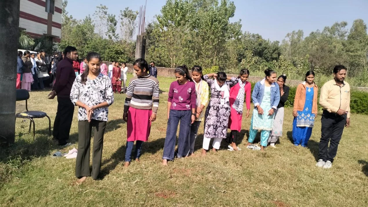 Students working together during an outreach activity